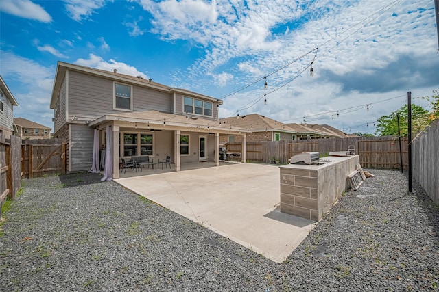 20864 Sheffield Park Dr, Porter, TX 77365 - back of house featuring a fenced backyard and a patio