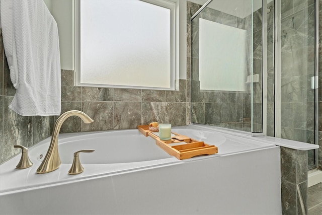 107 San Jacinto Dr, Baytown, TX 77523 - full bath with a stall shower and a bath
