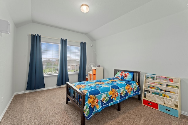 107 San Jacinto Dr, Baytown, TX 77523 - carpeted bedroom with lofted ceiling and baseboards