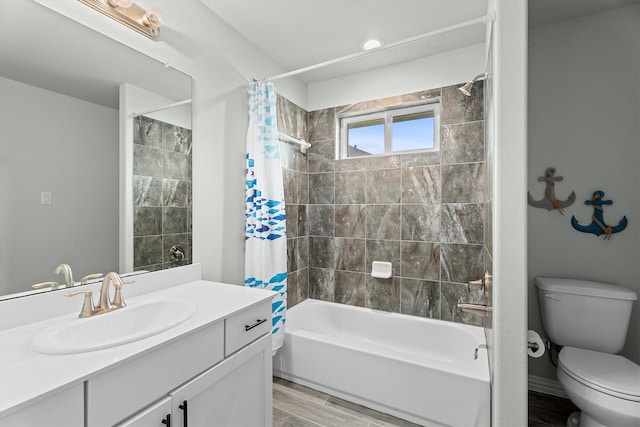 107 San Jacinto Dr, Baytown, TX 77523 - full bathroom featuring wood finished floors, vanity, toilet, and shower / bath combo with shower curtain