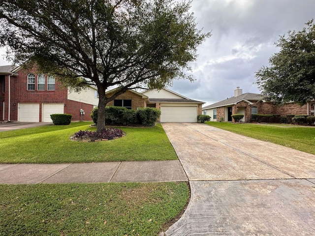view of front of home with brick siding, a garage, a front yard, and concrete driveway
