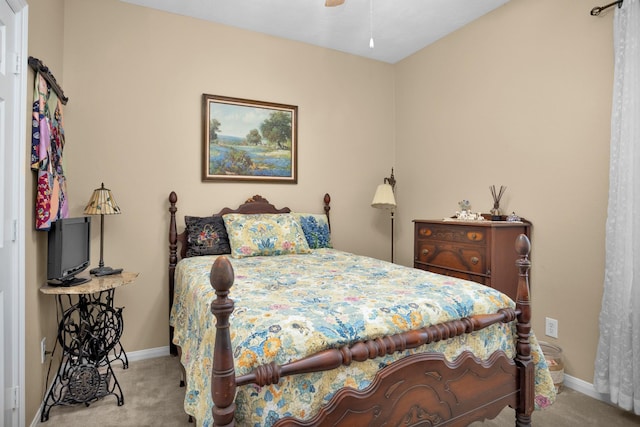 carpeted bedroom with baseboards