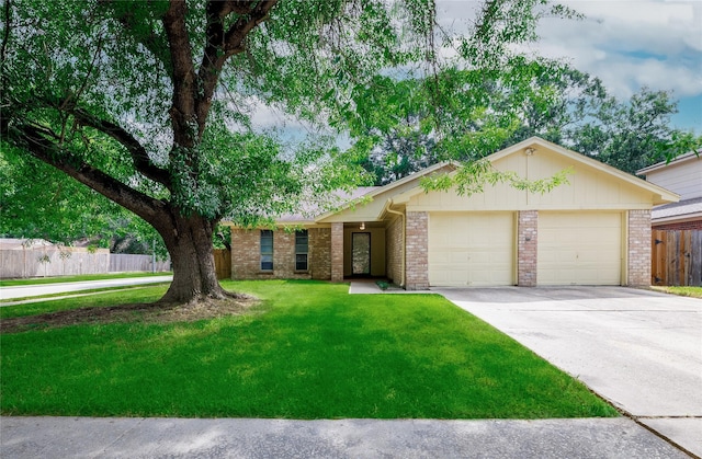 single story home with an attached garage, driveway, and brick siding