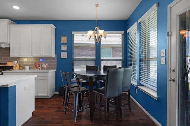9615 Carson Ln, Iowa Colony, TX 77583 - dining room with a chandelier, dark wood-type flooring, baseboards, and recessed lighting
