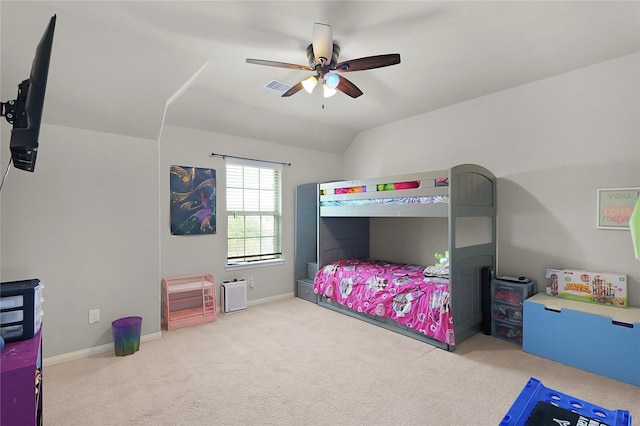 9615 Carson Ln, Iowa Colony, TX 77583 - carpeted bedroom with lofted ceiling, ceiling fan, and baseboards