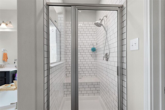 9615 Carson Ln, Iowa Colony, TX 77583 - bathroom with a stall shower and vanity