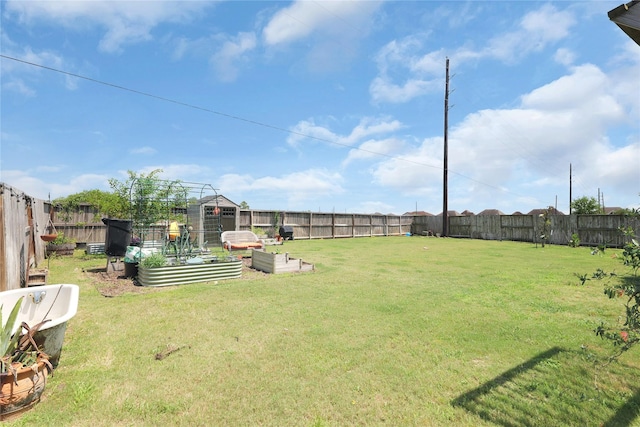 9615 Carson Ln, Iowa Colony, TX 77583 - view of yard with a vegetable garden