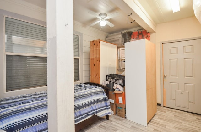 bedroom featuring wood finished floors and a ceiling fan
