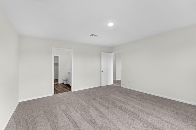 15311 Abella Dr, Montgomery, TX 77316 - unfurnished bedroom with carpet flooring, baseboards, and recessed lighting