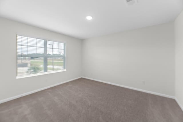 15311 Abella Dr, Montgomery, TX 77316 - carpeted spare room with baseboards and recessed lighting