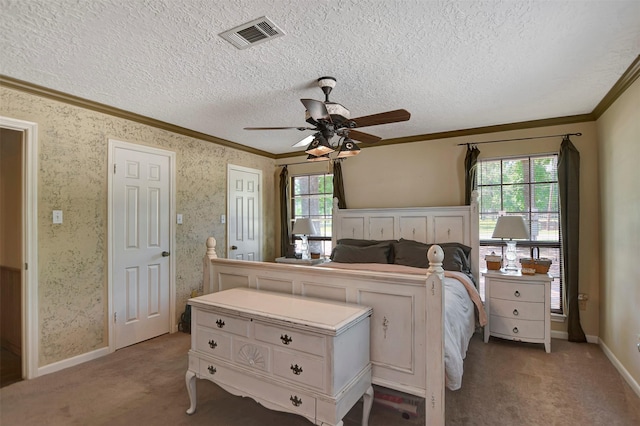 26410 Anderson Rd, Magnolia, TX 77354 - bedroom with multiple windows, light carpet, ornamental molding, baseboards, and a textured ceiling