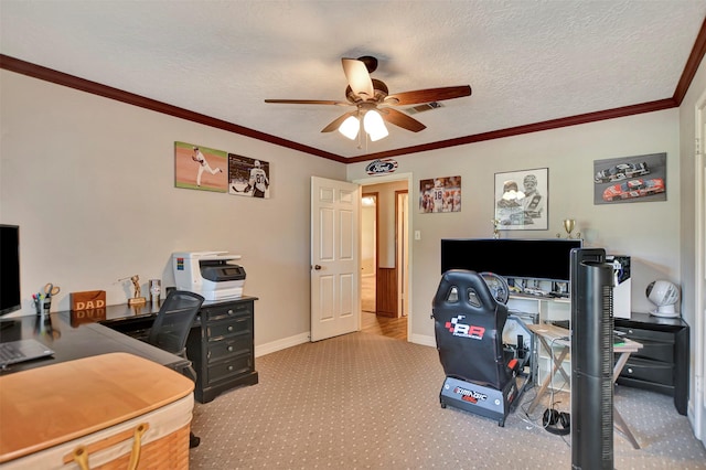 26410 Anderson Rd, Magnolia, TX 77354 - carpeted home office featuring a ceiling fan, baseboards, crown molding, and a textured ceiling