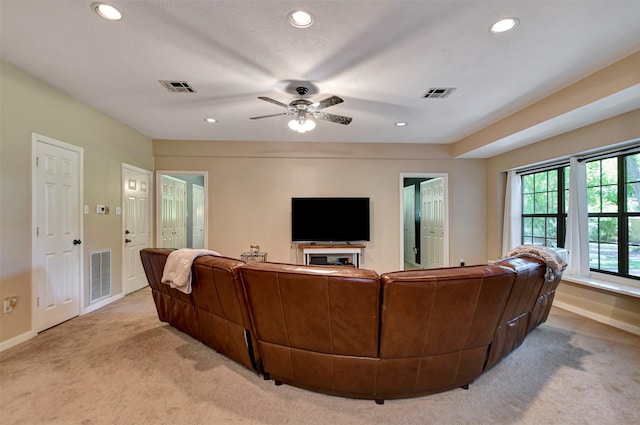 26410 Anderson Rd, Magnolia, TX 77354 - living area featuring light carpet, baseboards, recessed lighting, and ceiling fan