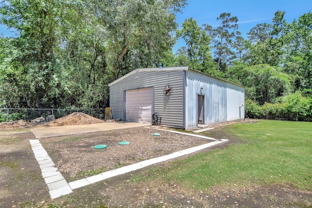 26410 Anderson Rd, Magnolia, TX 77354 - view of outdoor structure featuring an outdoor structure and driveway