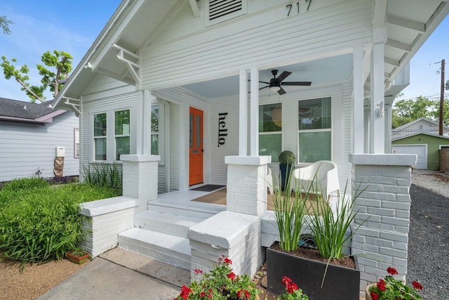 717 E 23rd St, Houston, TX 77008 - doorway to property with a porch, ceiling fan, and a detached garage