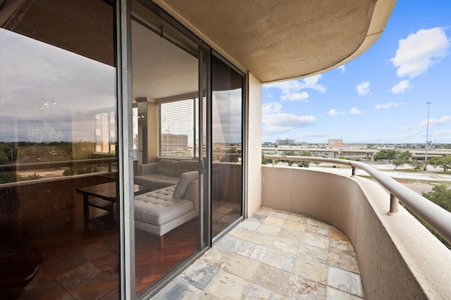 balcony featuring a city view