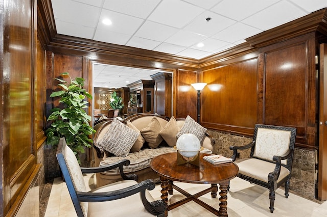 community lobby with crown molding, recessed lighting, and wood walls