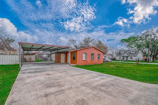 view of front of home featuring concrete driveway and brick siding