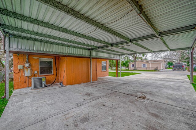 garage with central AC unit