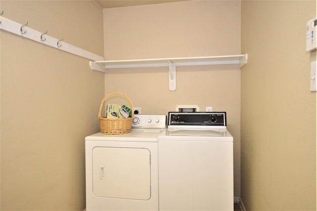 laundry area with washer and dryer