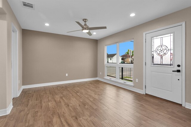 6845 Avenue N, Houston, TX 77011 - foyer entrance featuring a ceiling fan, light wood finished floors, baseboards, and recessed lighting