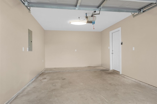 garage with electric panel and a garage door opener