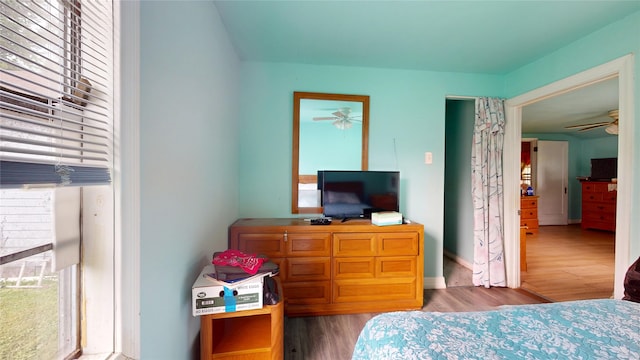 415 Briarcliff Dr, Houston, TX 77076 - bedroom featuring wood finished floors and multiple windows