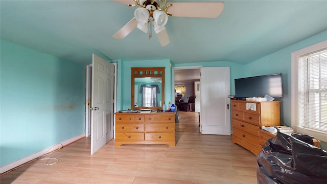 415 Briarcliff Dr, Houston, TX 77076 - bedroom with light wood-type flooring, vaulted ceiling, and ceiling fan
