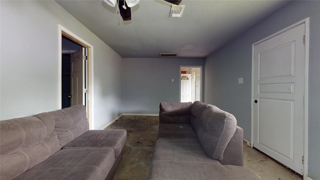 415 Briarcliff Dr, Houston, TX 77076 - living area with ceiling fan and a textured ceiling