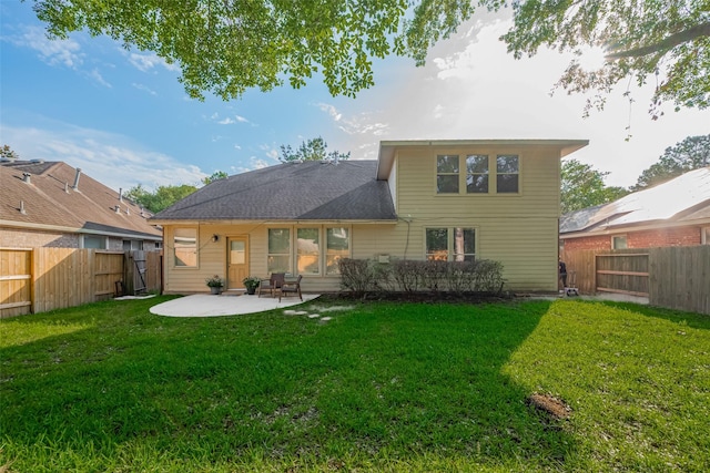 rear view of property featuring a patio