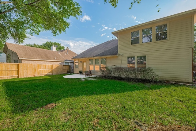 back of house with a patio