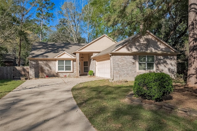 194 Velvet Leaf Pl, The Woodlands, TX 77380 - single story home with an attached garage, brick siding, and driveway