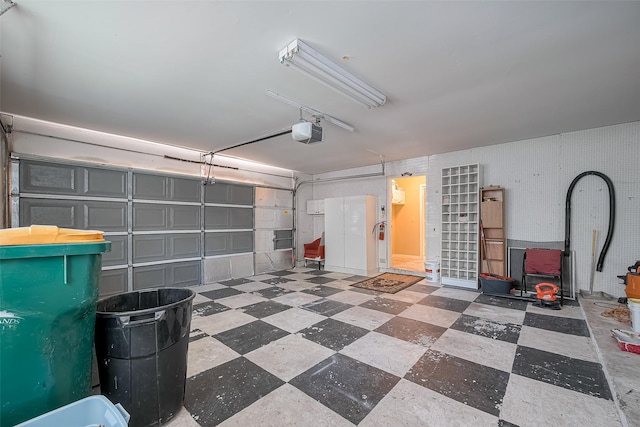 194 Velvet Leaf Pl, The Woodlands, TX 77380 - garage with a garage door opener
