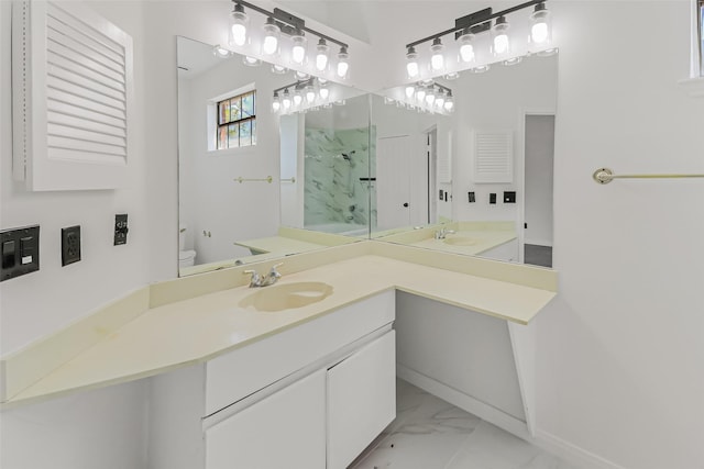 8888 Benning Dr Unit 313, Houston, TX 77031 - full bath with marble finish floors, toilet, vanity, a shower, and baseboards