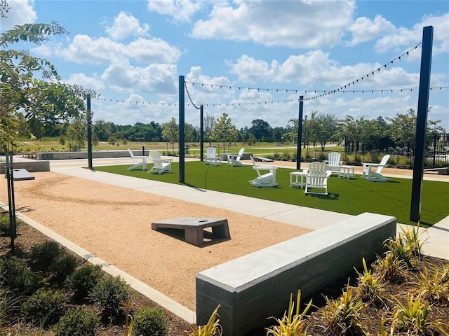surrounding community featuring a lawn