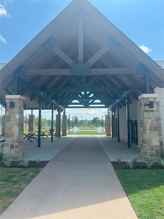 view of home's community with a carport