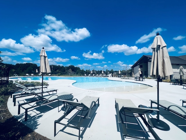 community pool featuring a patio