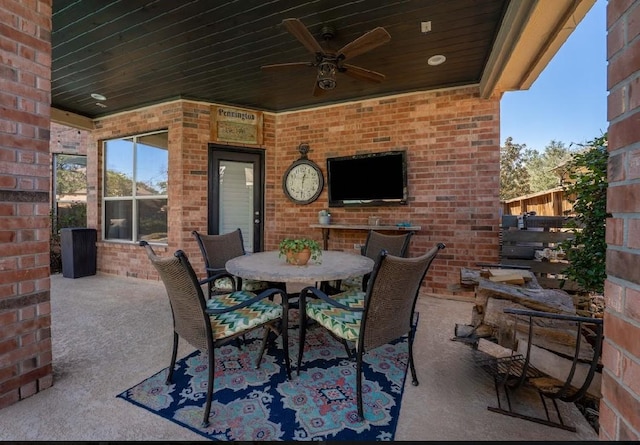 view of patio / terrace featuring outdoor dining space and ceiling fan
