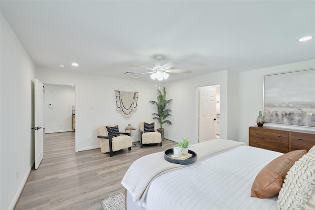 bedroom with recessed lighting, light wood-style flooring, baseboards, and a ceiling fan
