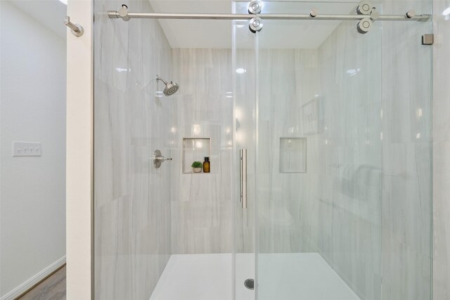 bathroom with a stall shower