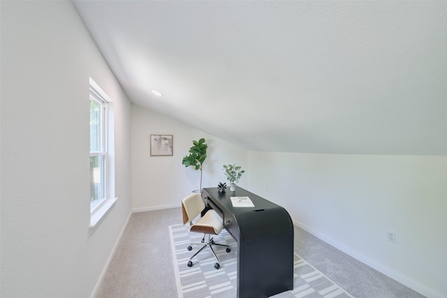 office area with lofted ceiling, carpet, and baseboards