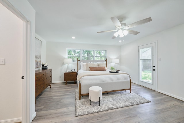 bedroom featuring light wood-style floors, recessed lighting, ceiling fan, access to exterior, and baseboards