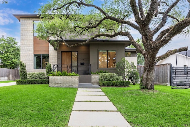 view of front of house featuring brick siding