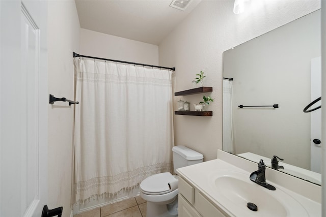 bathroom with toilet, tile patterned flooring, vanity, and a shower with shower curtain