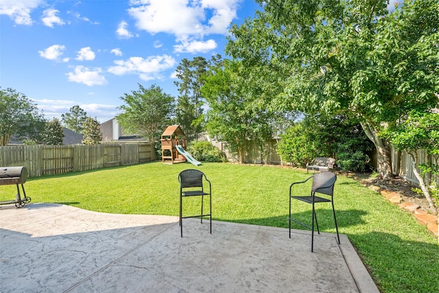 view of patio featuring a playground