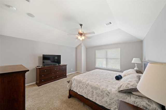 carpeted bedroom with vaulted ceiling, ceiling fan, and baseboards