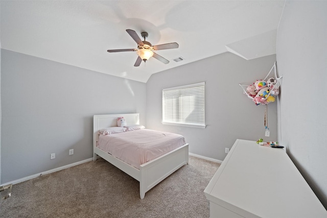 bedroom featuring lofted ceiling, light colored carpet, a ceiling fan, and baseboards