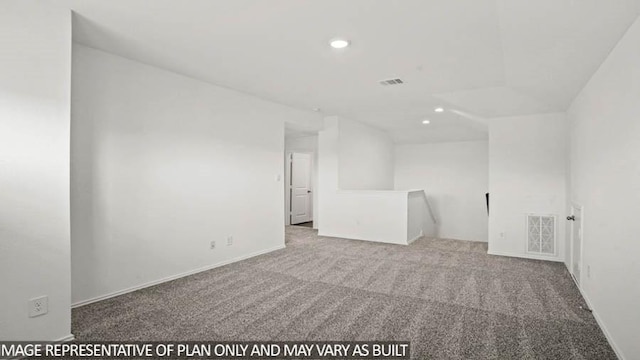 carpeted spare room with recessed lighting and baseboards