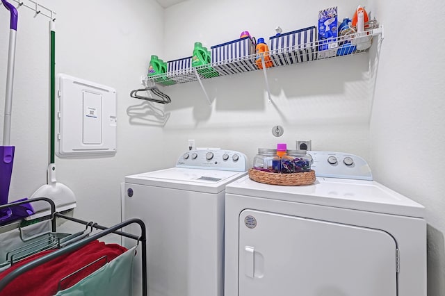 10707 Lost Maples Dr, Cleveland, TX 77328 - laundry area featuring independent washer and dryer and electric panel