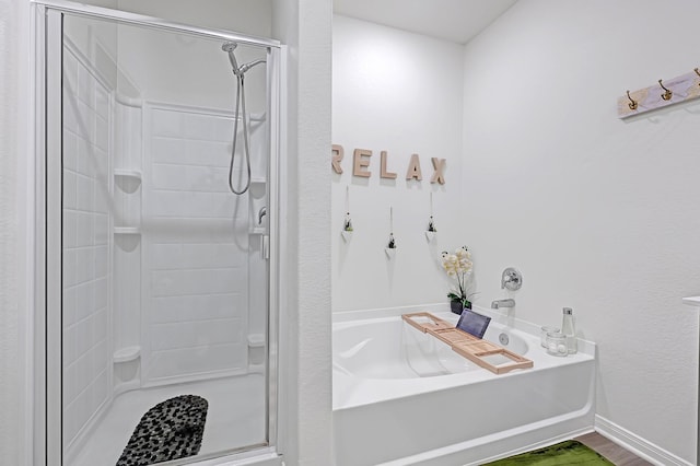10707 Lost Maples Dr, Cleveland, TX 77328 - full bath with a stall shower and a garden tub